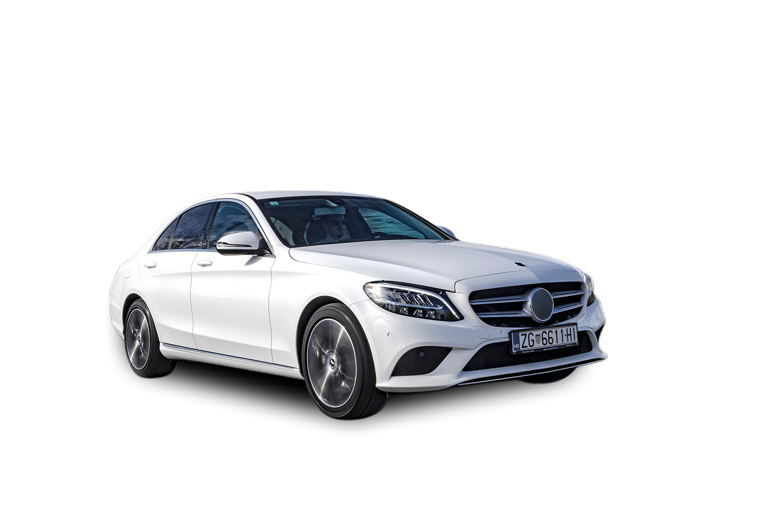 The same sedan cut out on a transparent background with a drop shadow